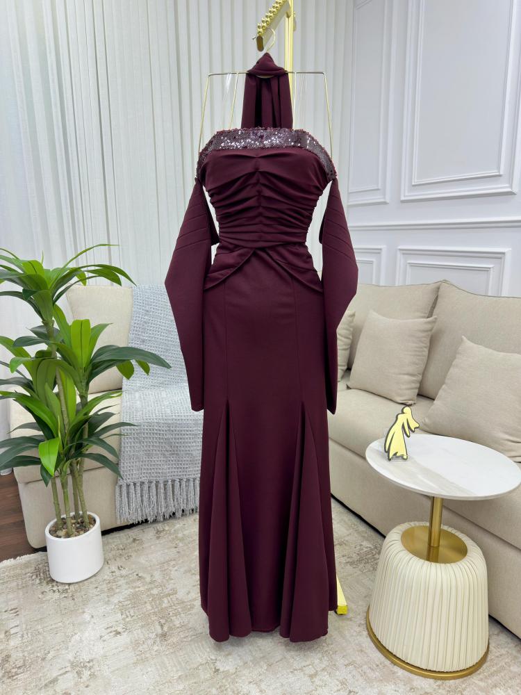 Elegant evening dress in burgundy color, sophisticated, luxurious, made of Barbie fabric
