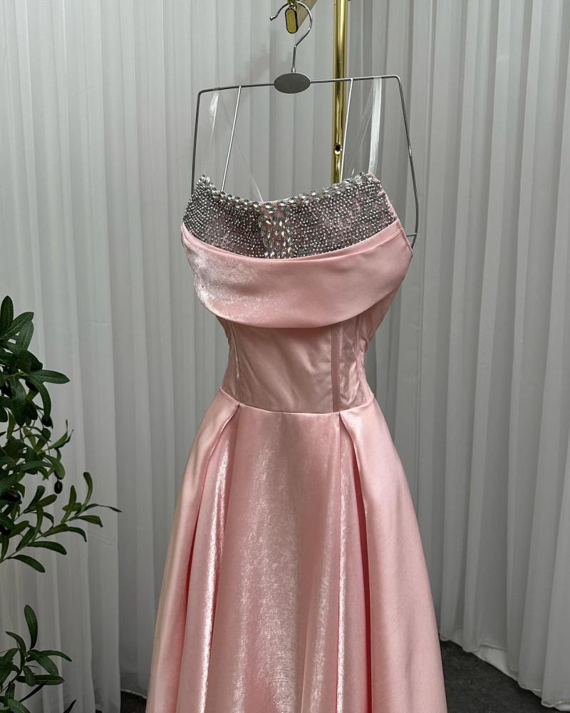 Elegant evening dress, pleated fabric on organza