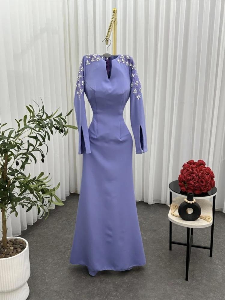Elegant evening dress, stylish color, Barbie fabric, with hand embroidery on the sleeve