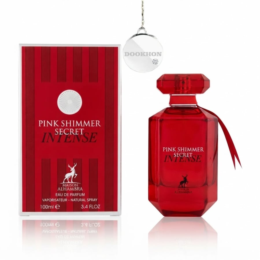 عطر بينك شيمر سيكريت إنتنس ميزون الهمبراء بجانب العلبة الحمراء الفاخرة