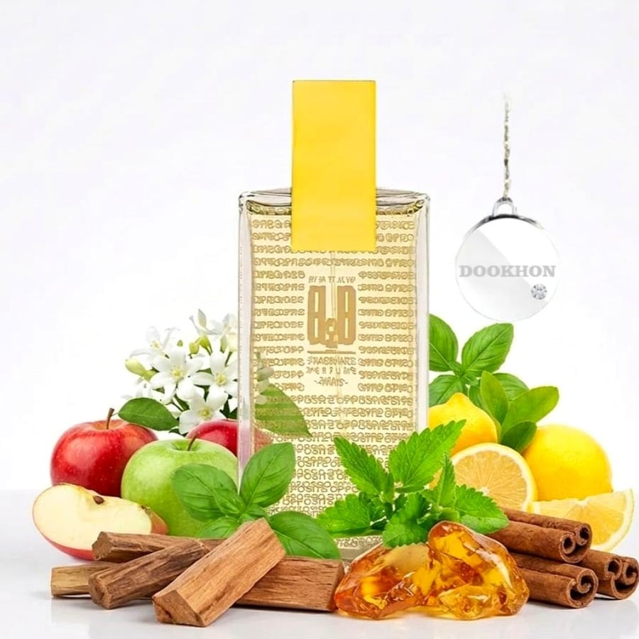 زجاجة عطر أوبوسيت إتش تو أو محاطة بمكونات التفاح والليمون والقرفة والع