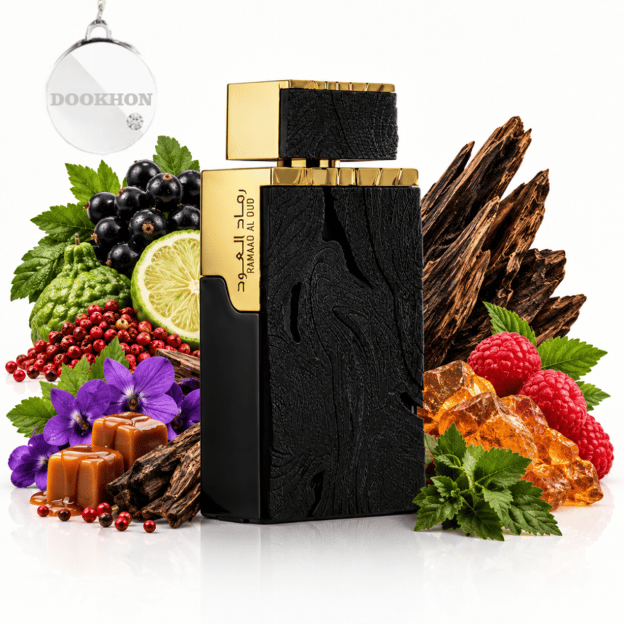 عطر رماد العود 100 مل محاط بمكونات التوت والكراميل والعود والبرغموت ال