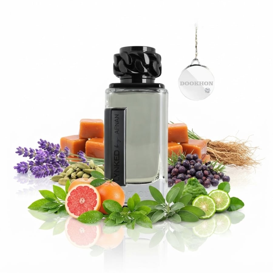 زجاجة عطر لينكد فريدوم الفاخرة محاطة بمكونات البرغموت والجريب فروت وال