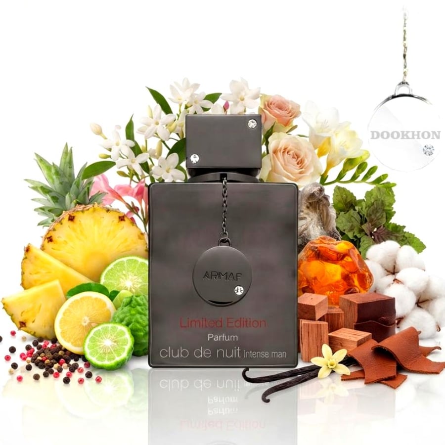 عطر كلوب دي نوي إنتنس مان 105 مل محاط بمكونات الأناناس والليمون والزهو