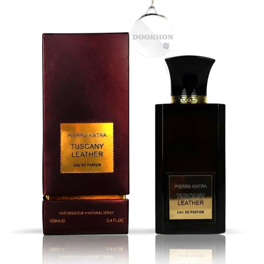 عطر توسكاني ليذر بيري كاترا بجانب العلبة الفاخرة ذات التصميم الراقي