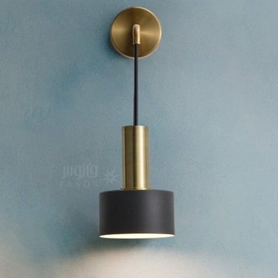 Sophisticated black wall appliqué with a golden base