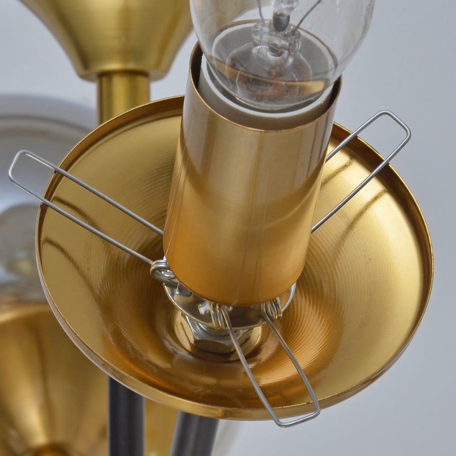 Modern chandelier with gold base and 8 glass balls