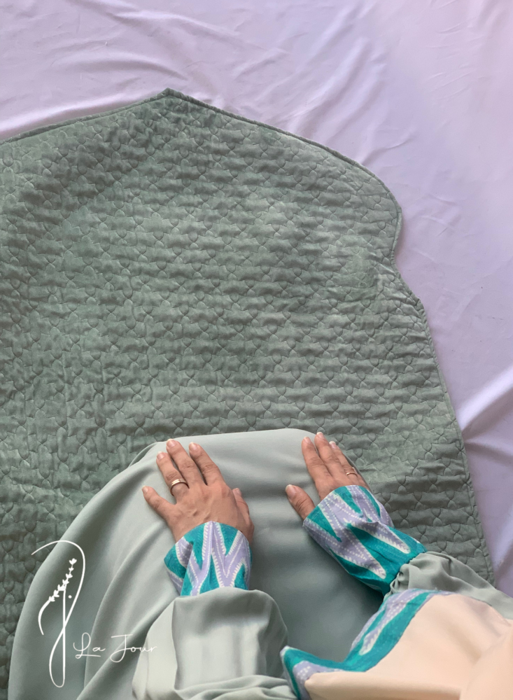 Green batik prayer shawl with zipper. The scarf is attached.