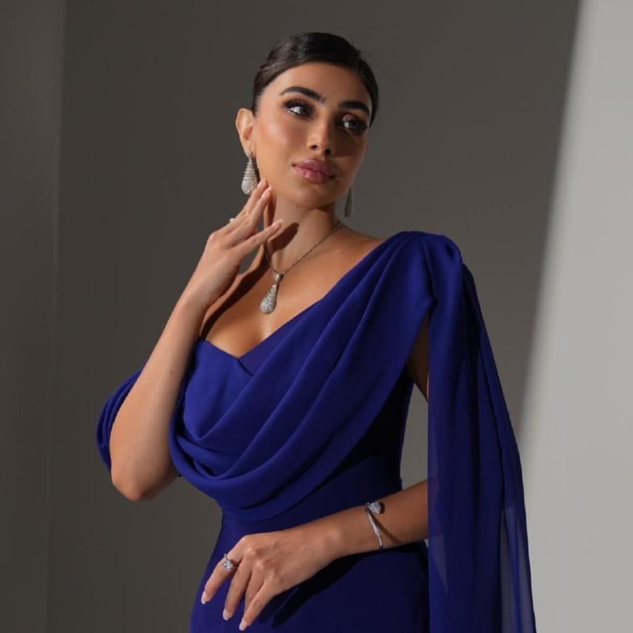 فستان سهرة نيلي أوف شولدر كريب من sky fashion