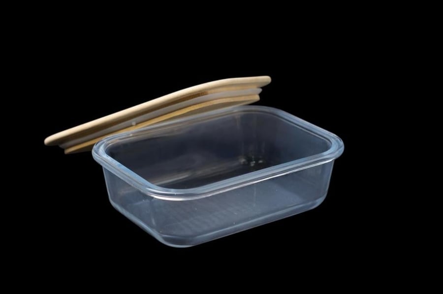 Glass food container with wooden lid