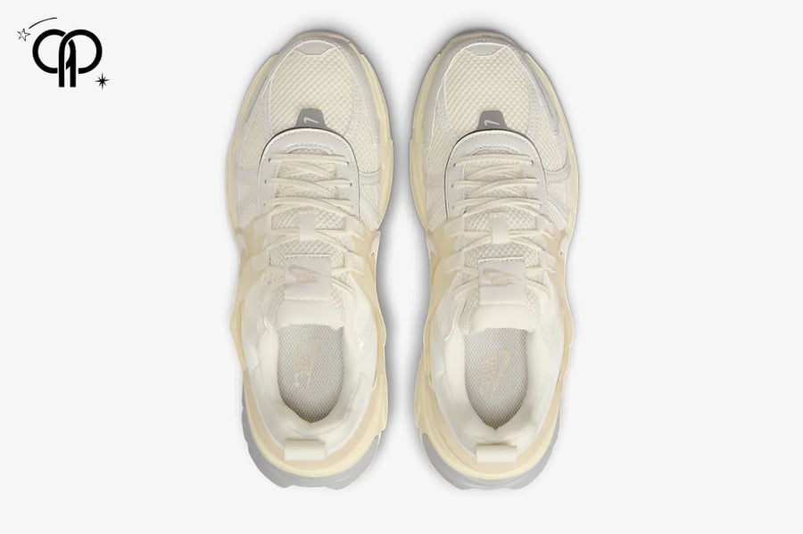 حذاء نسائي نايك M2K أصفر مع أبيض a Nike V2K Run women's shoe in a light, neutral colorway