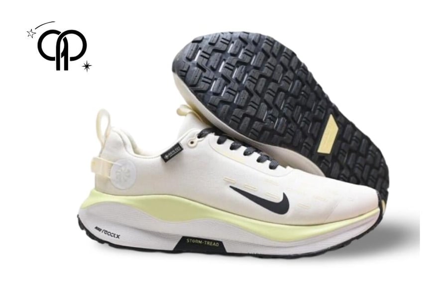 حذاء رجالي نايك ابيض مع اصفر a Nike Women's ReactX Infinity Run 4 GORE-TEX road running shoe in the Pale Ivory and Anthracite colorway.