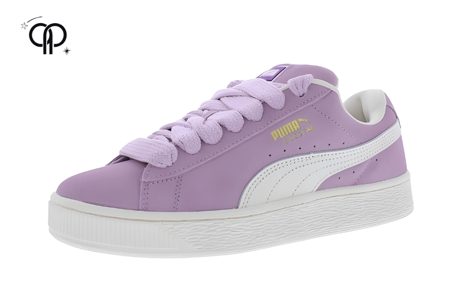 حذاء نسائي بوما بينك Puma Suede XL sneaker in a light purple and white colorway.