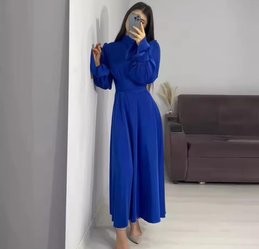 A soft dress with long sleeves and ruffles