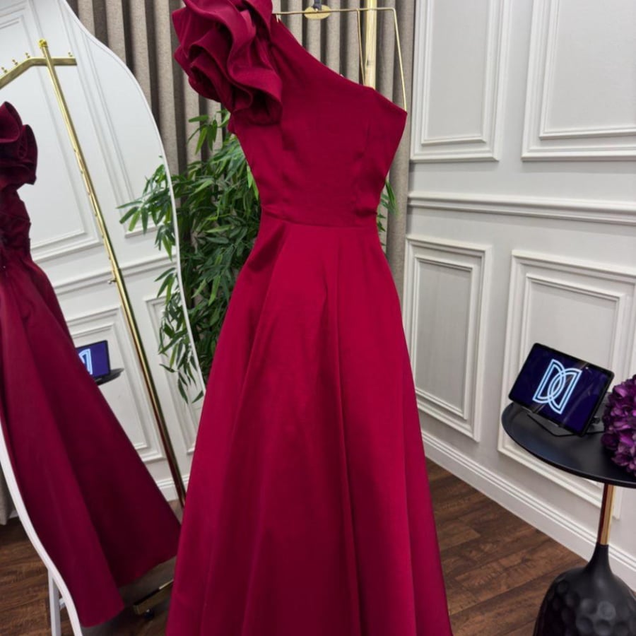 A charming soft red evening dress