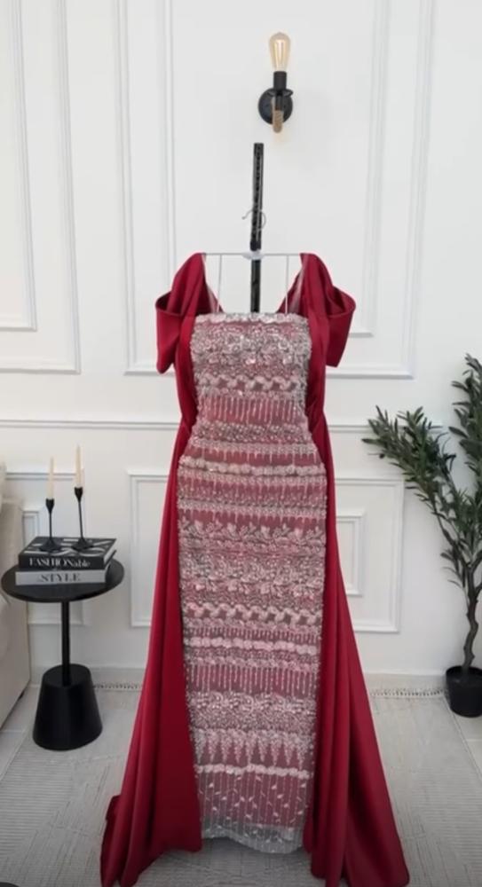 Luxurious dress with full embroidery and a separate tail