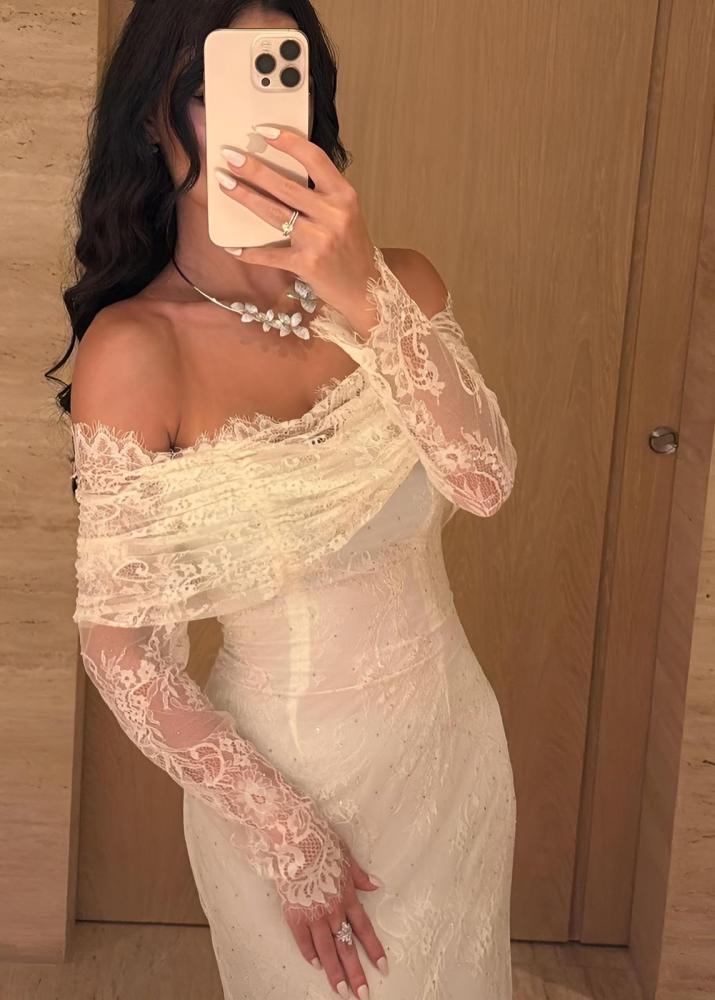 Lace dress decorated with rhinestones