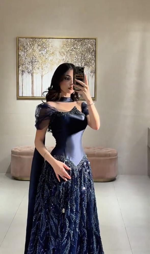 Elegant navy blue dress with evening embroidery