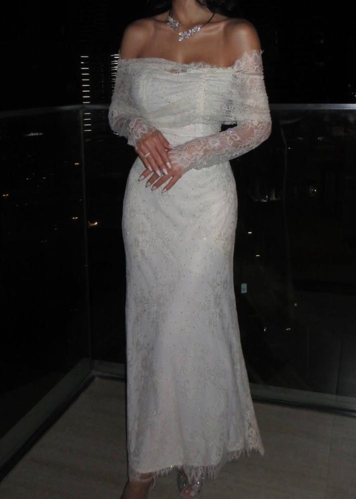 Lace dress decorated with rhinestones