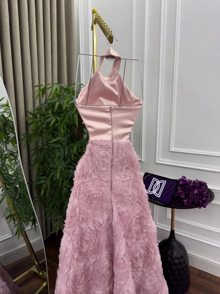 Evening dress with a decorated chest