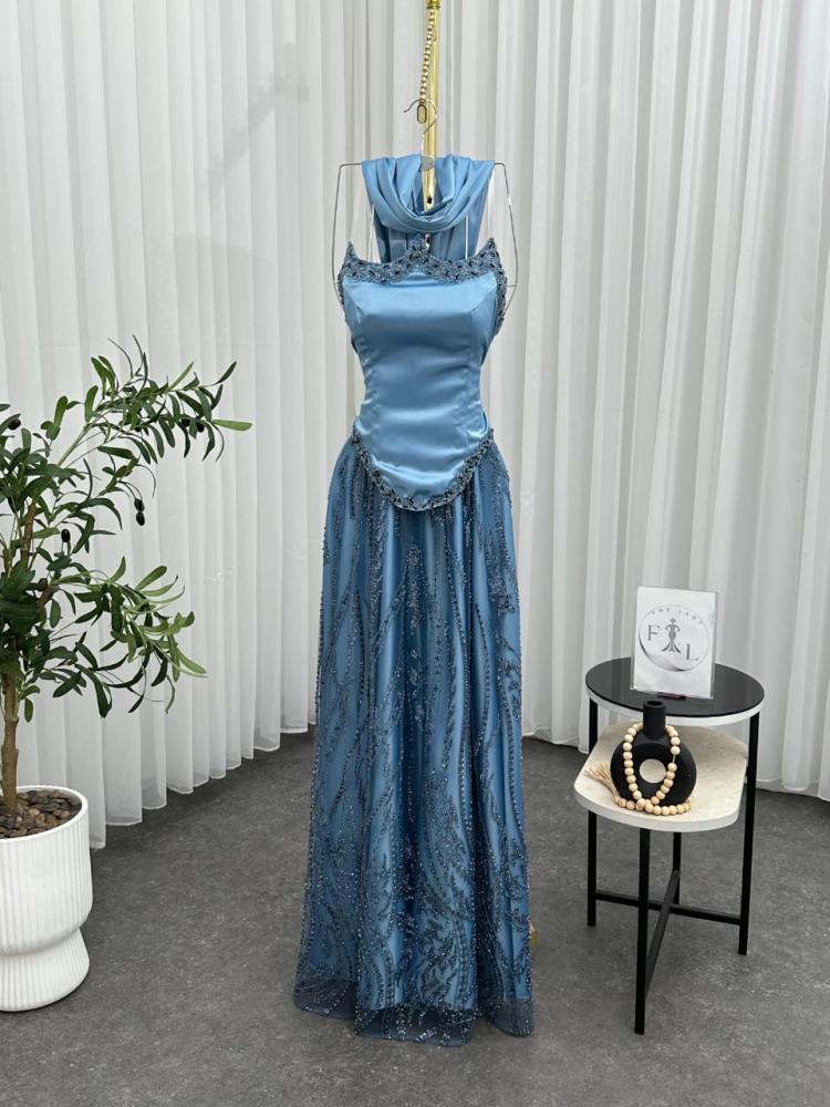 Luxurious dress with a scarf