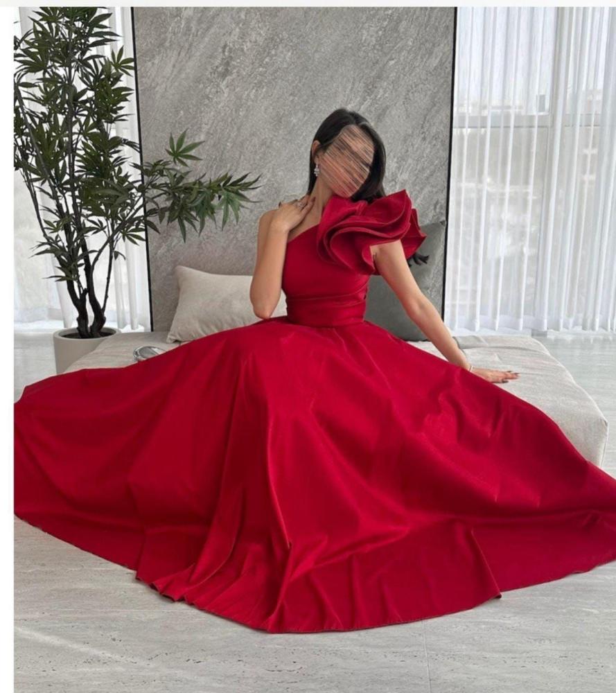 A charming soft red evening dress