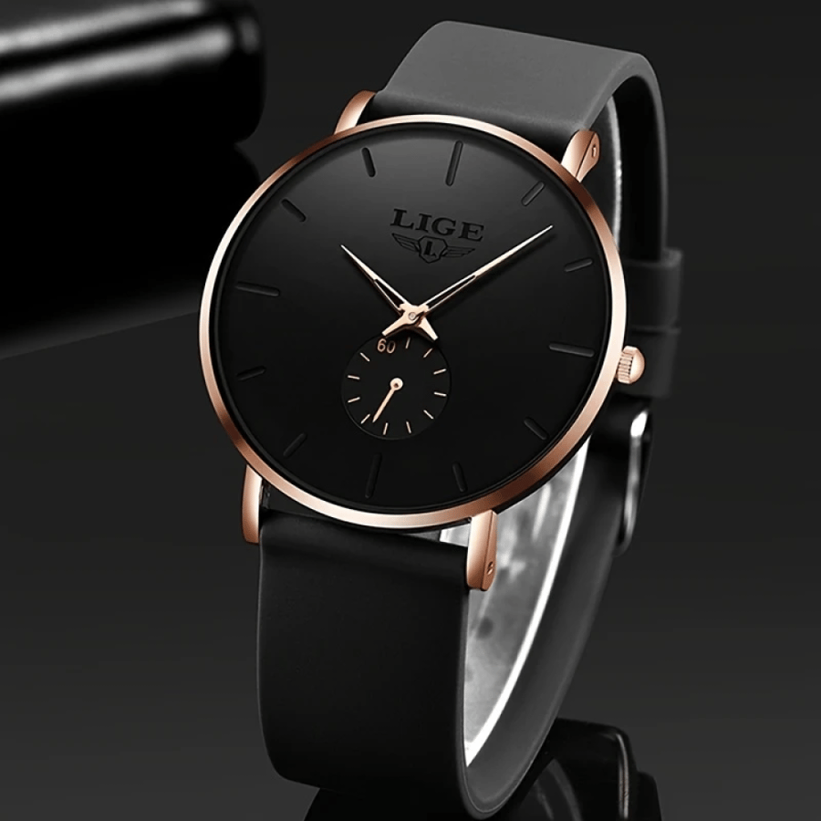 Elegant men's black watch with rose gold frame