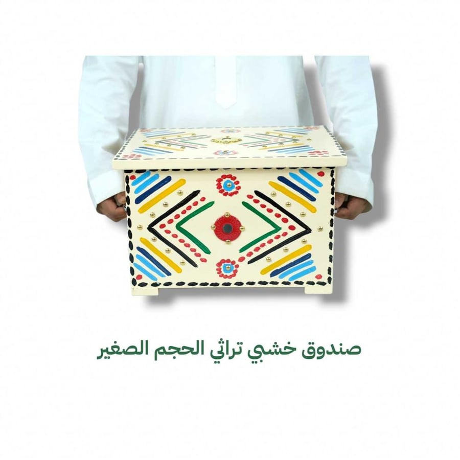 Wooden heritage box with hand-carved designs beige