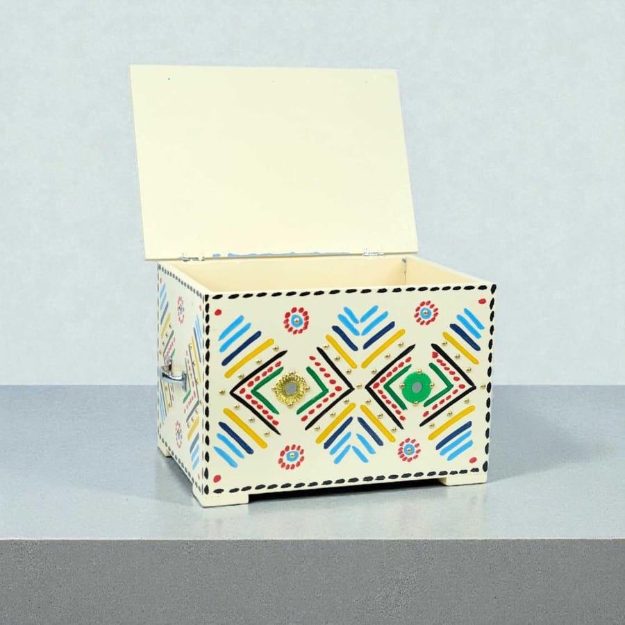 Wooden heritage box with hand-carved designs beige