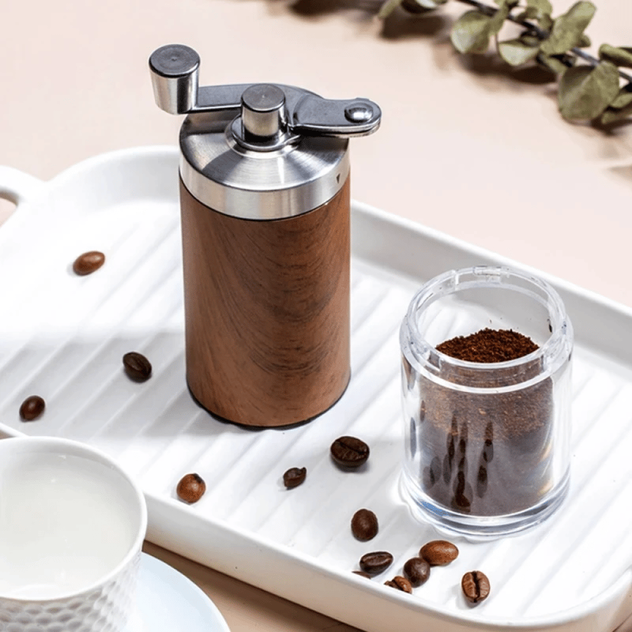 Hand-operated coffee grinding tool