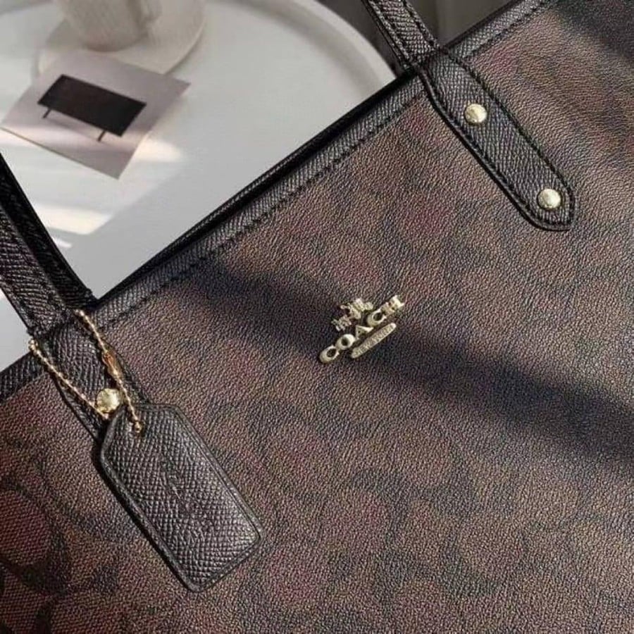 COACH أسود وبني