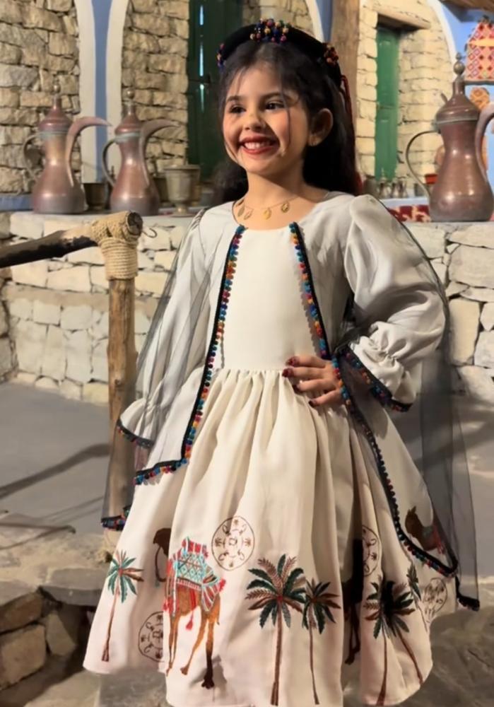 Girls' dress for Founding Day, elegance