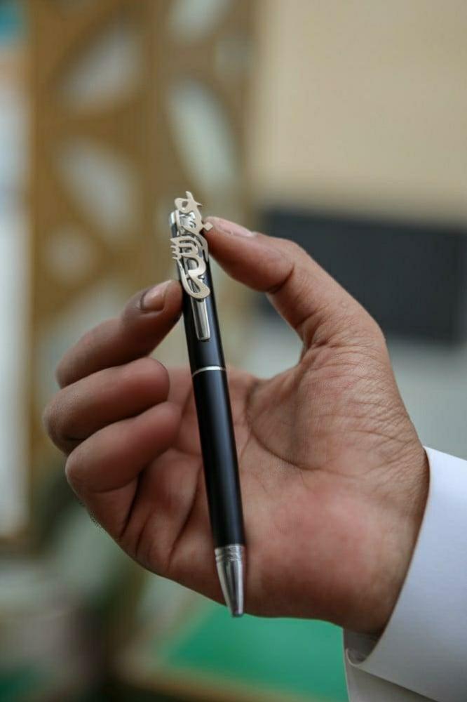 قلم بالاسم أنيق