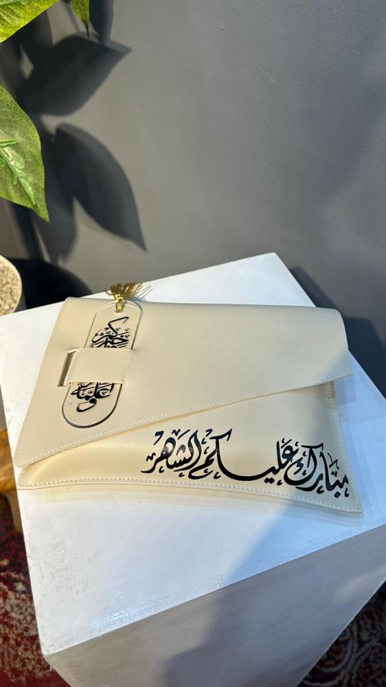 شنطه جلد مع سجاده وفاصل قراني