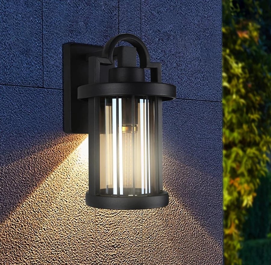 External black wall lantern with honey-colored round