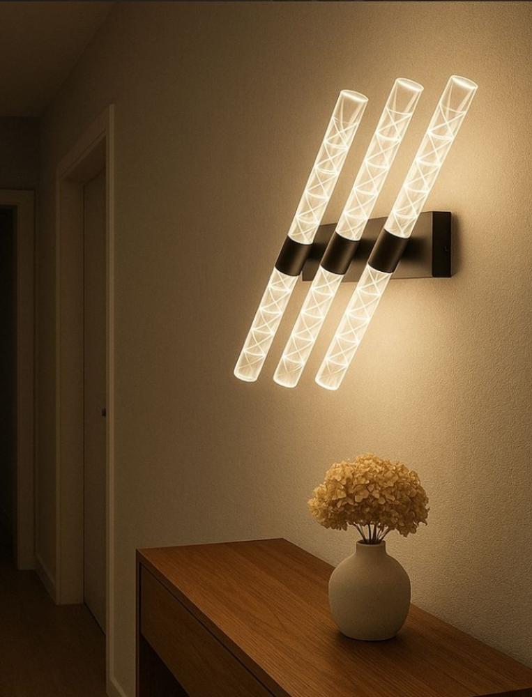 مصباح جداري مودرن أسود بتصميم أنبوبي وإضاءة LED مدمجة توفر ثلاثة ألوان مختلفة من كريستال المدى للإنارة
