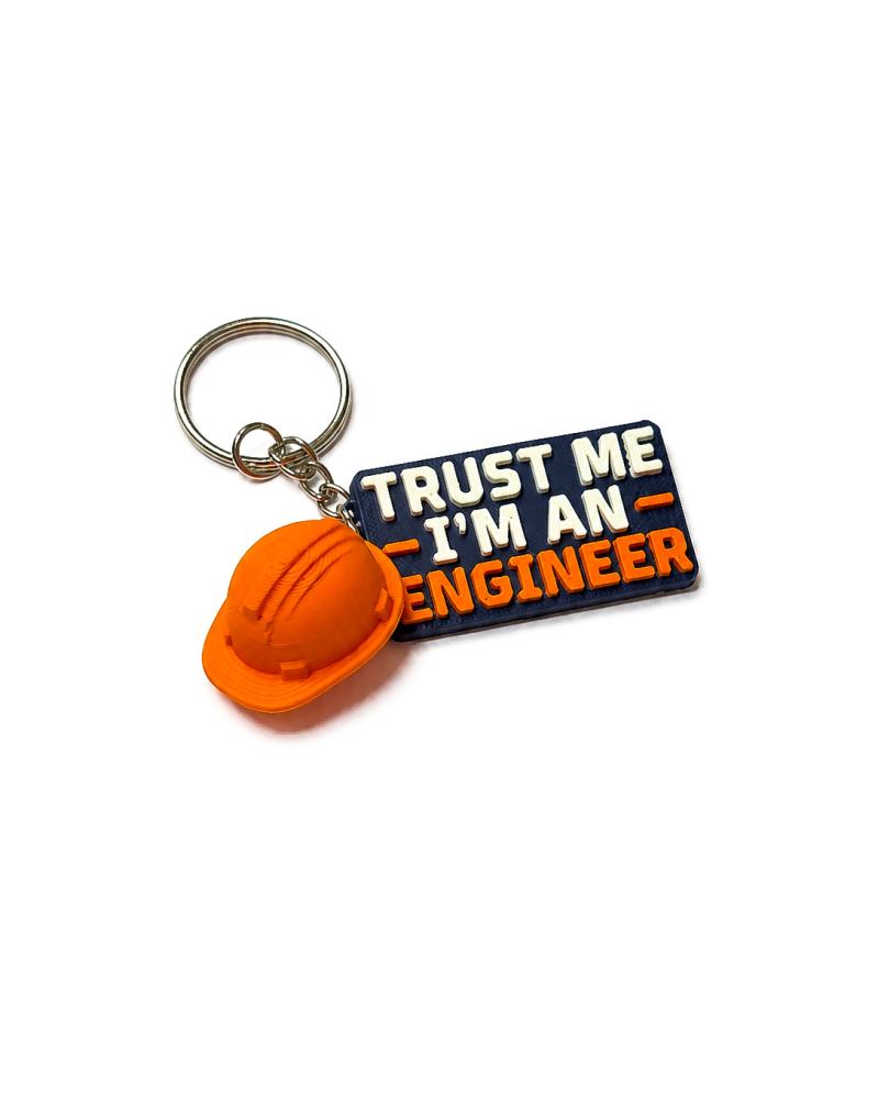 ميدالية مهندس - مفتاح يدوي مع خوذة برتقالية وشعار "Trust Me I'm An Engineer"
