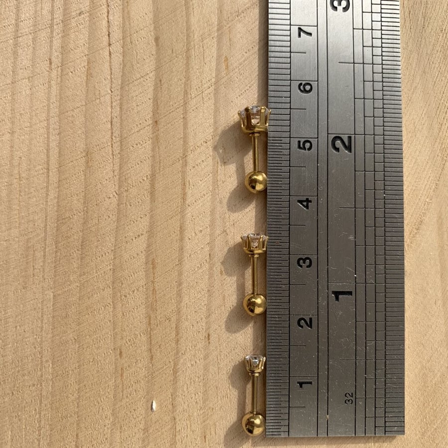 كرستال بيرسنق ذهبي 16g طبي