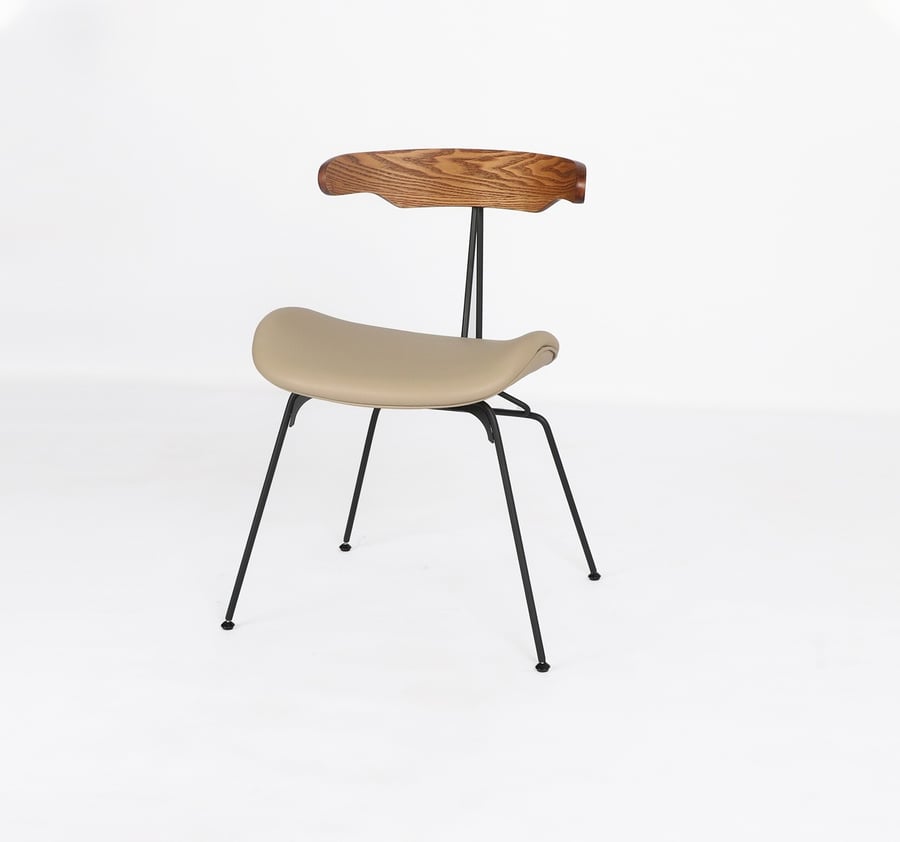 Elegant and comfortable dining chair with modern design for the dining table, beige color