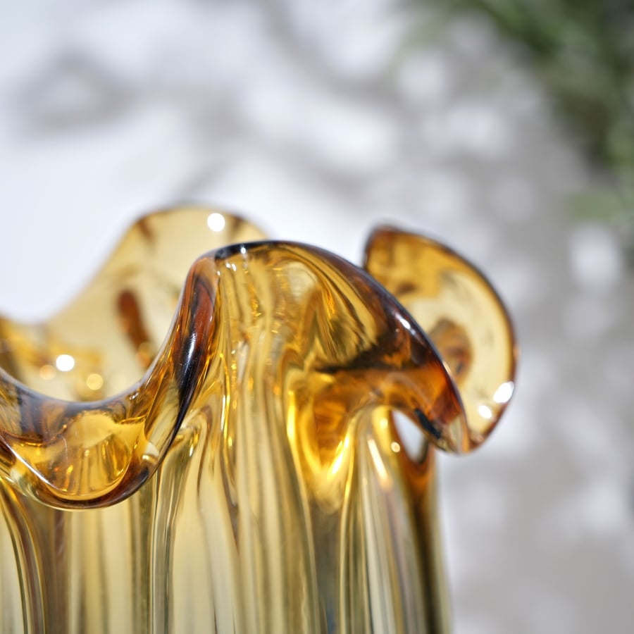 Glass decorative vase with a distinctive artistic design