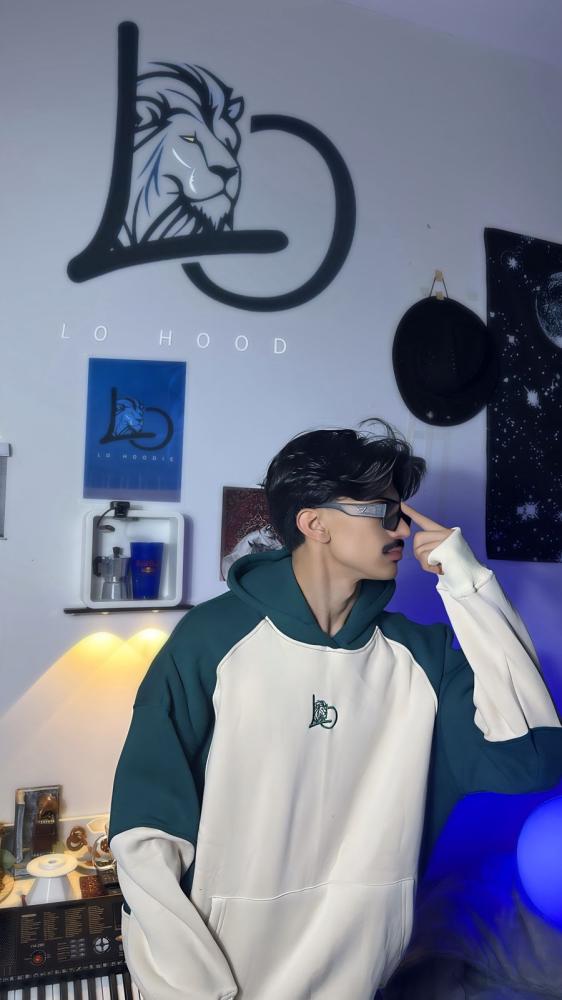 مناسب للجنسين Green and beige hoodies