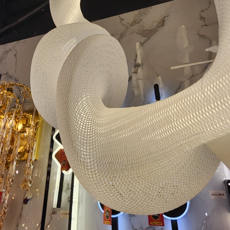 Modern chandelier with rose petal rope