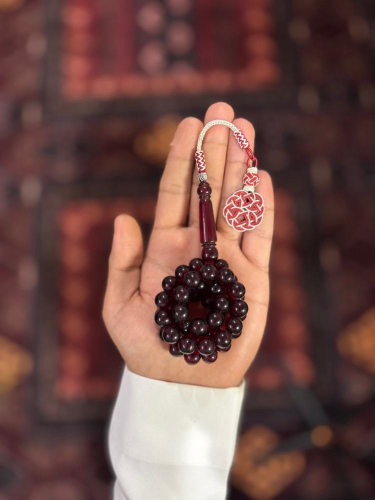 مسباح بكلايت عنابي شفاف بطربزونة