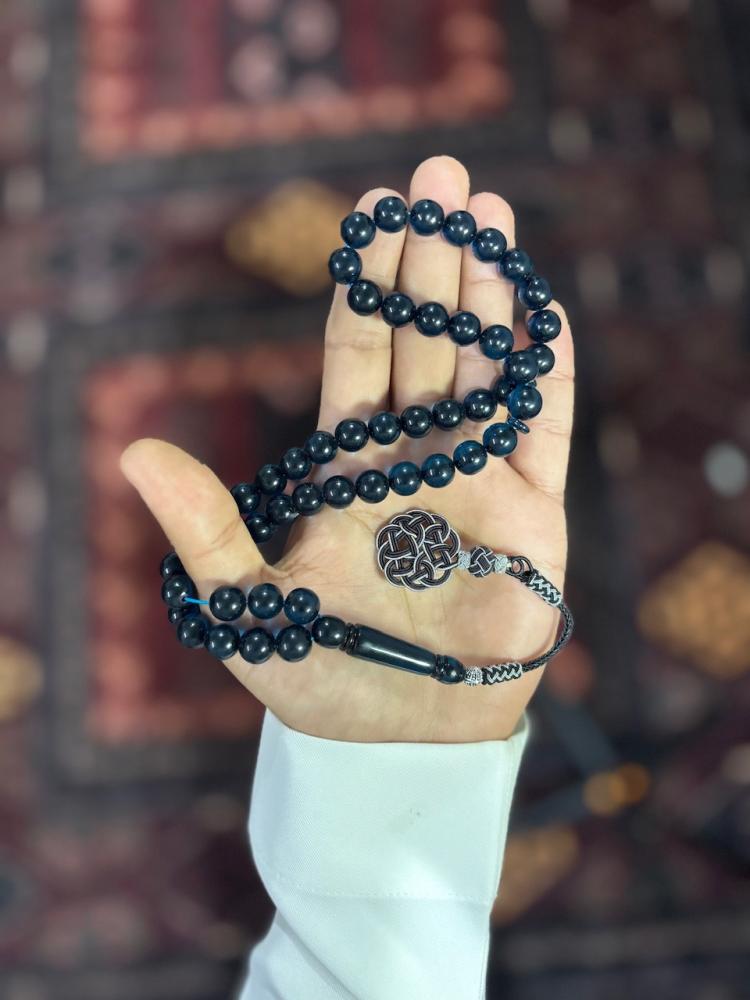 مسباح بكلايت كحلي شفاف بطربزونة