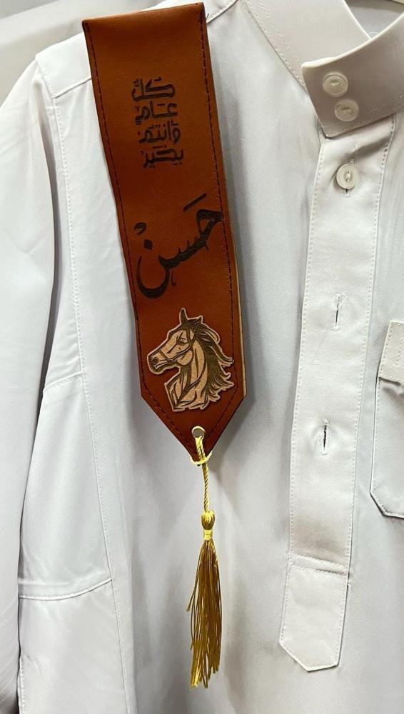 Children's brooch, long with a tassel