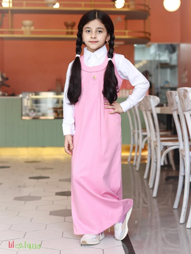 Pink primary apron with middle button closure