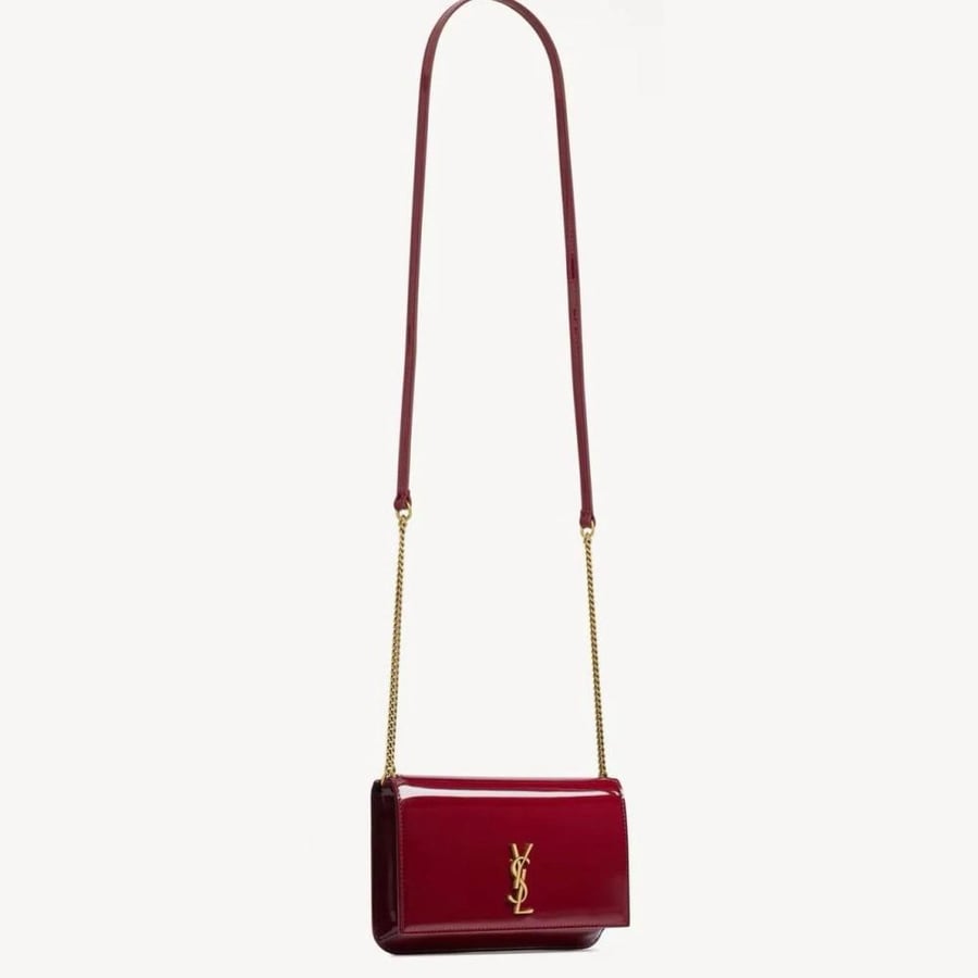 Red shiny bag from YSL with all accessories