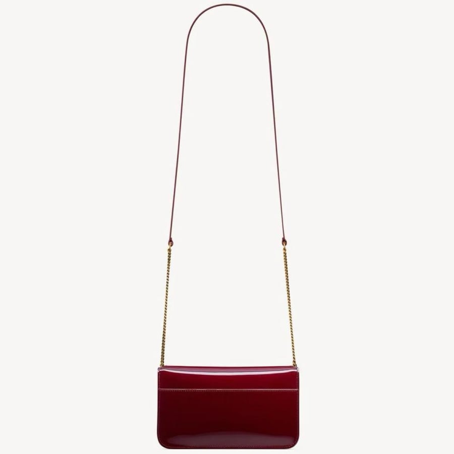 Red shiny bag from YSL with all accessories