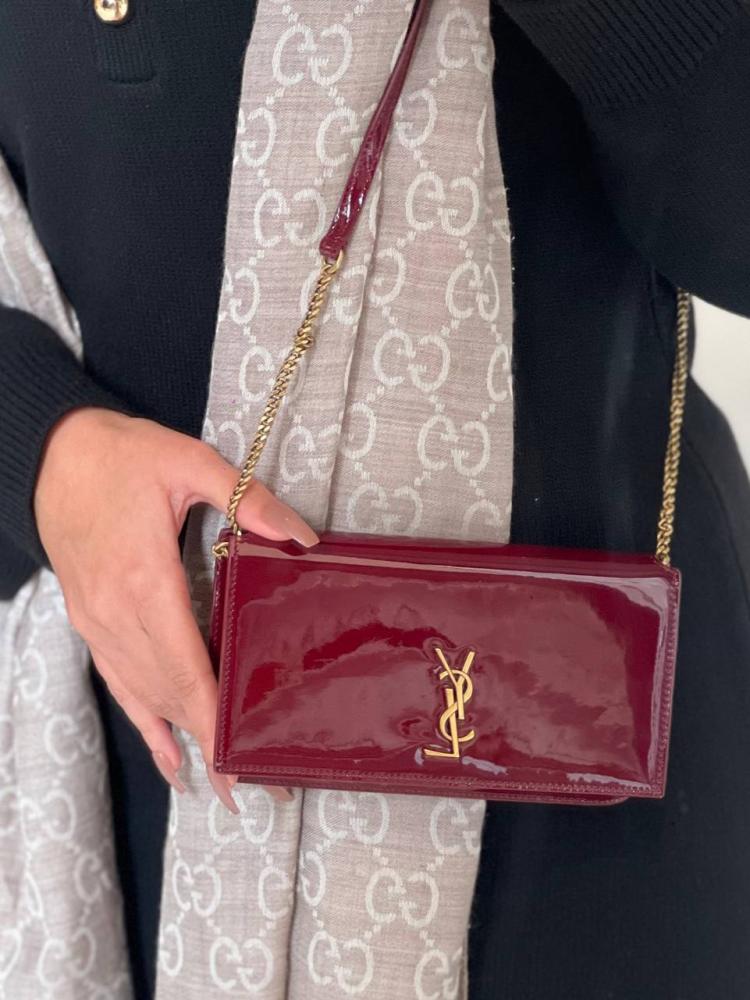 Red shiny bag from YSL with all accessories