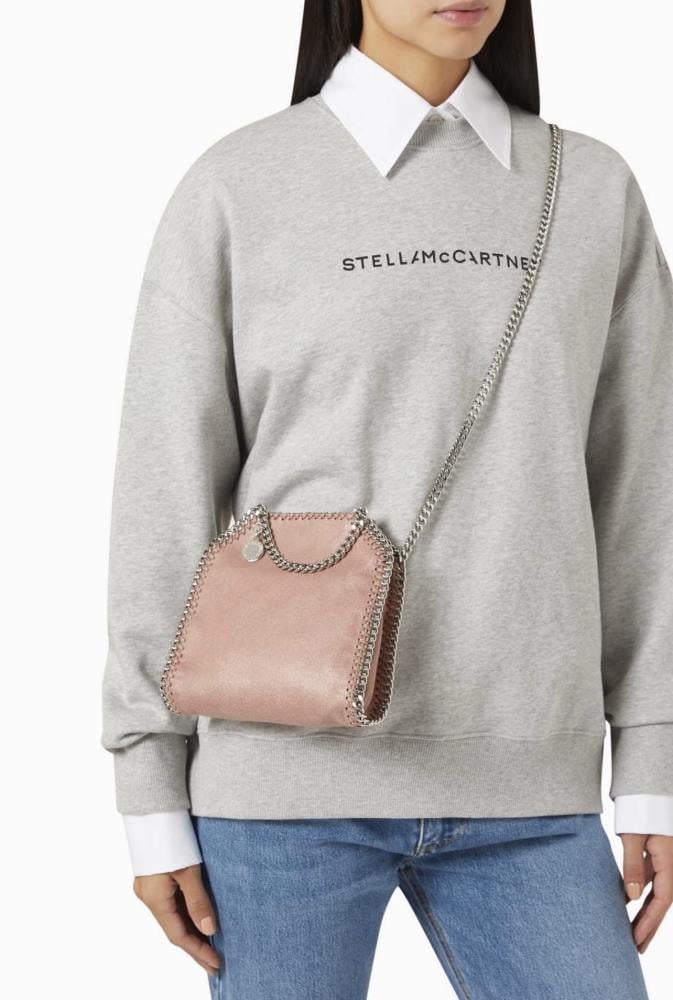 Stella Nude bag with silver necklace